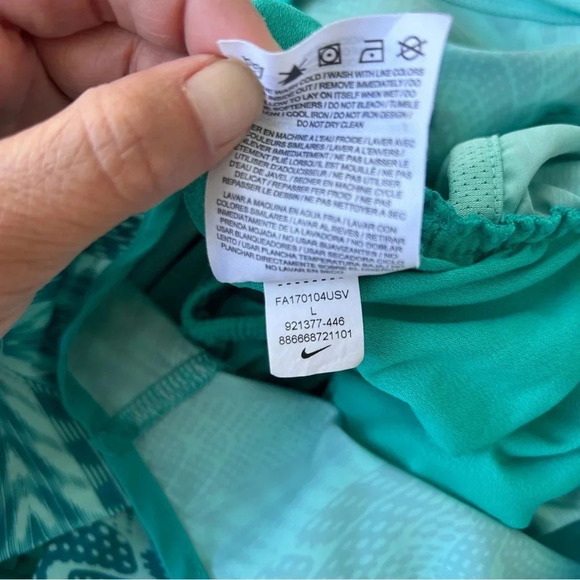 Women’s Nike Dri Fit Teal & Turquoise All Over Kaleidoscope Print Running Shorts - Picture 7 of 8